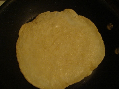 Flip when lightly browned.