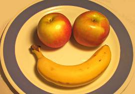 plate with apples and banana